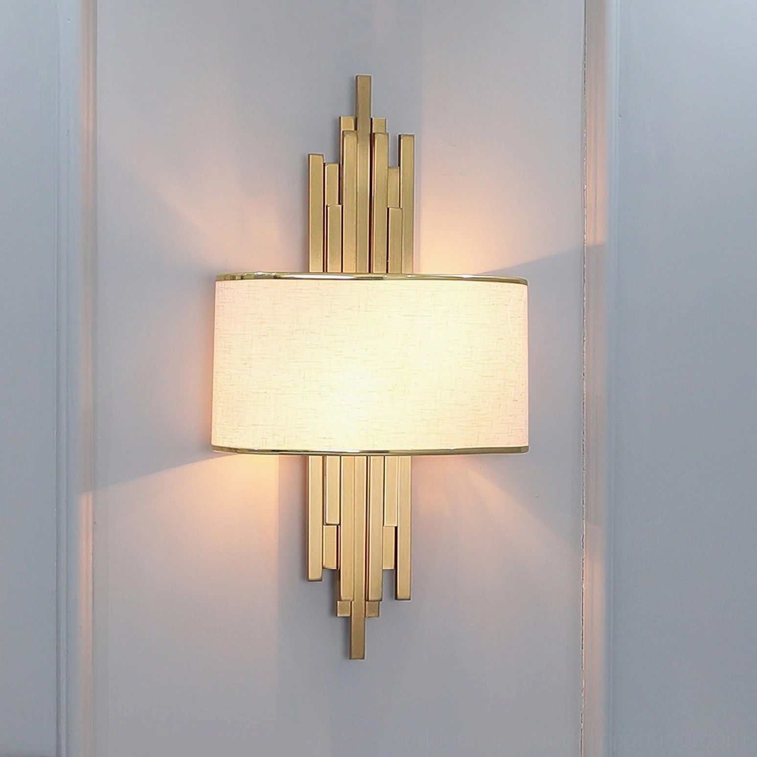Laurina modern wall sconce with dual socket configuration and minimalist geometric metal design