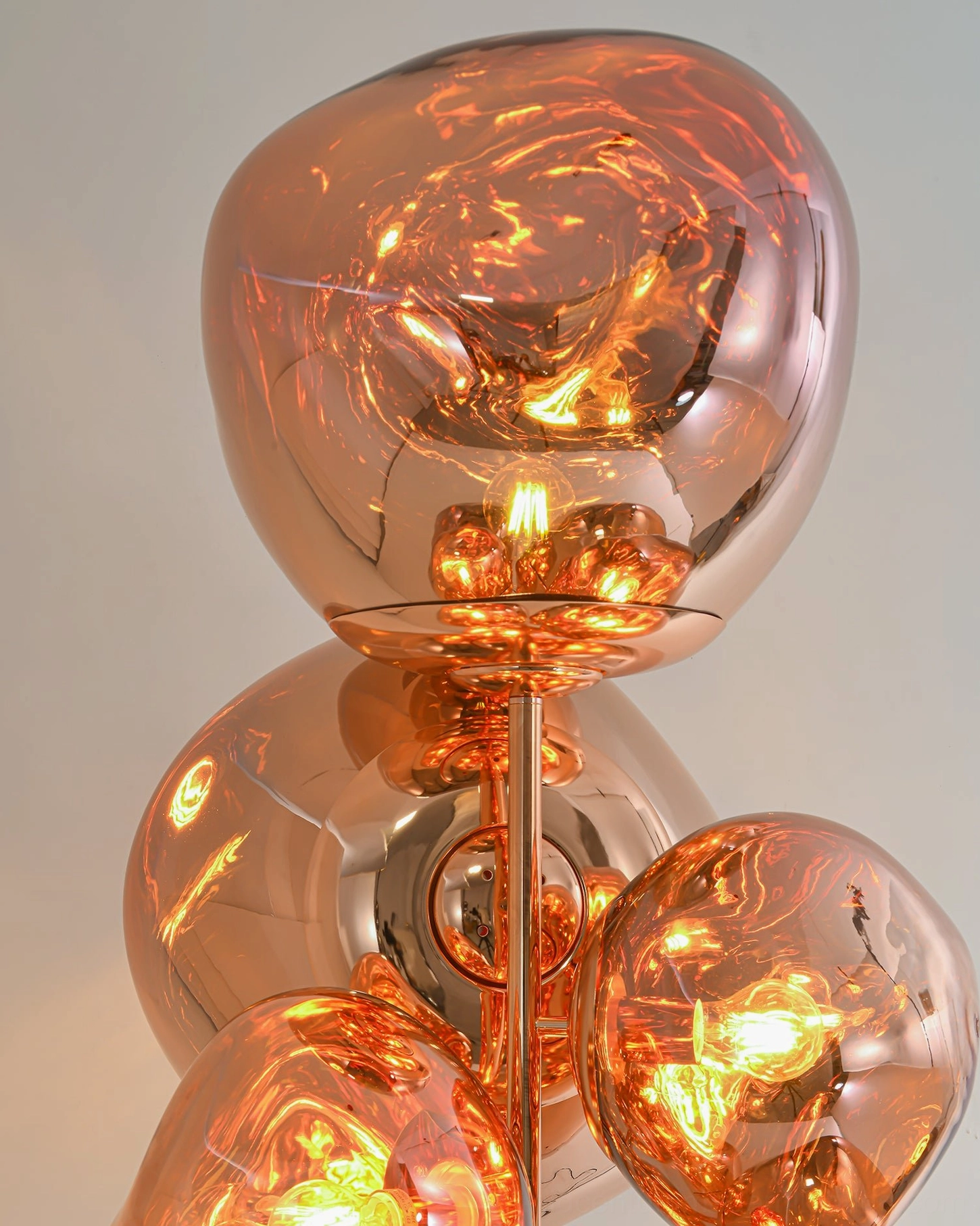Modern lava cone floor lamp artistic installation showing glass cone shades and metallic frame