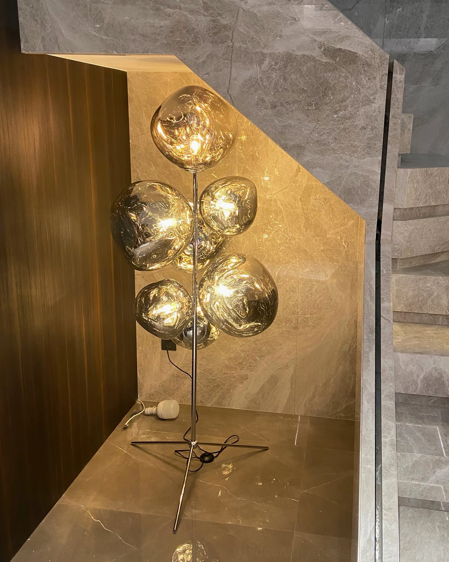Contemporary lava cone floor lamp with clean lines and sculptural glass dome shades