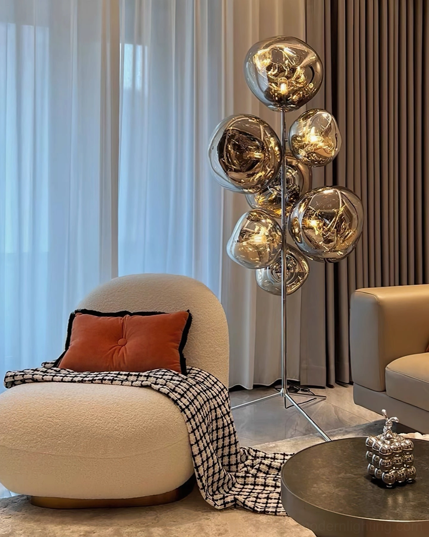 Lava cone floor lamp in modern minimalist living room setting with warm ambient lighting
