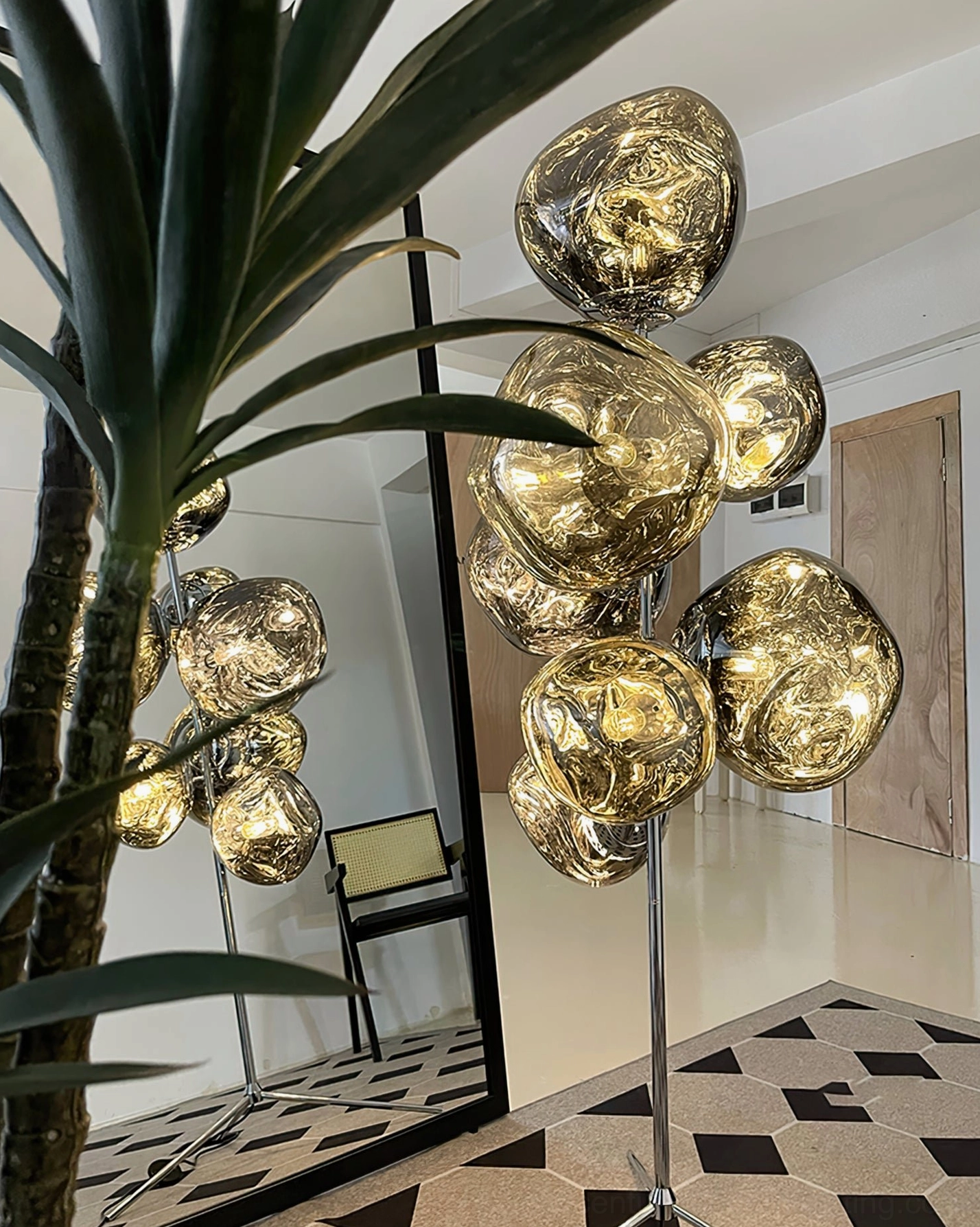 Lava cone floor lamp positioned as room lighting focal point showing ambient illumination