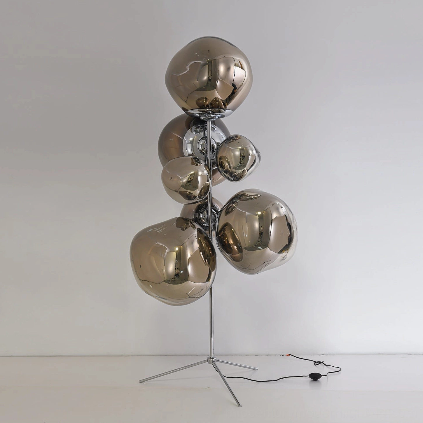 Modern cone floor lamp in rose gold metallic finish showing elegant contemporary design