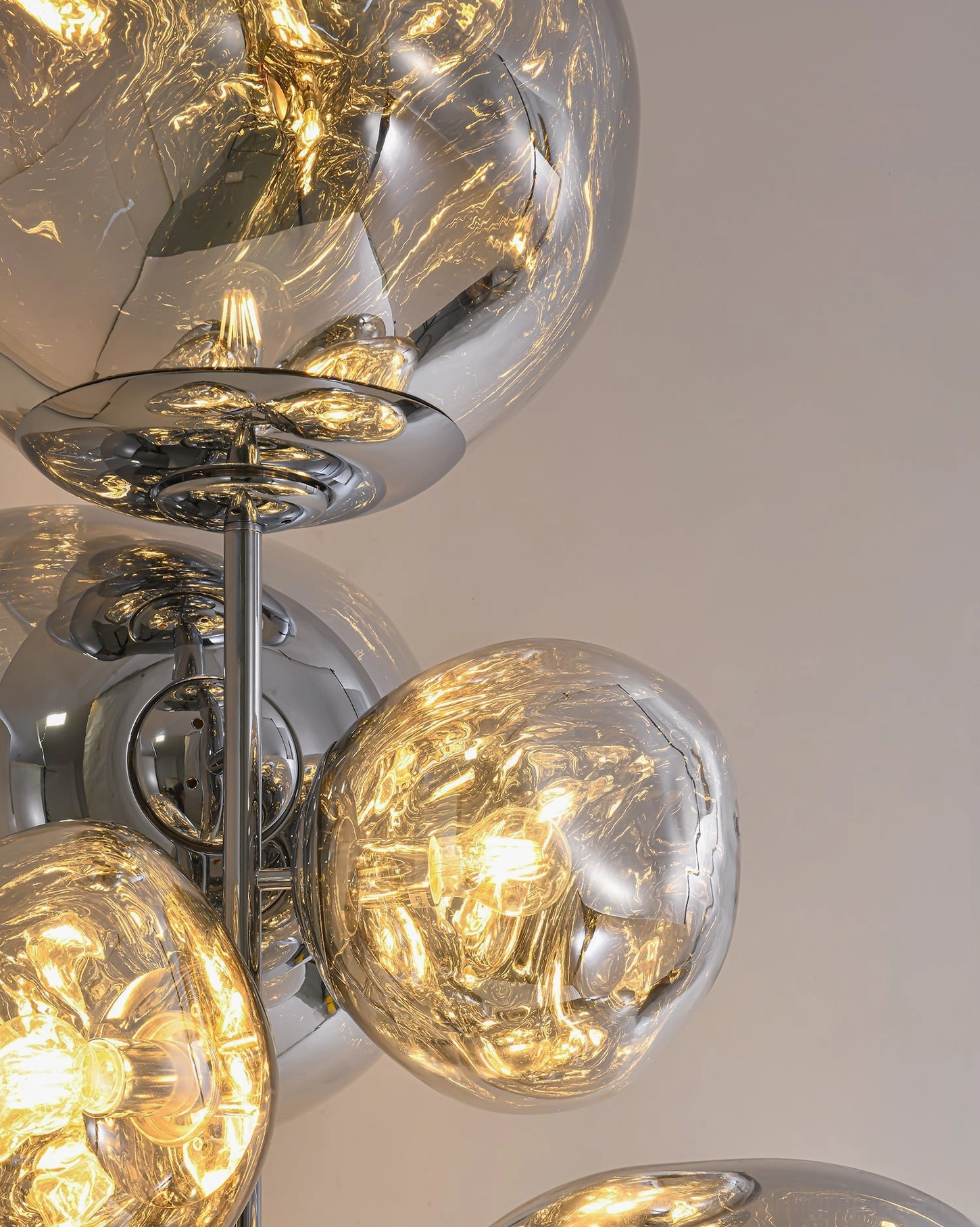 Lava cone floor lamp rose gold finish variant with molten glass shades and metal tripod base