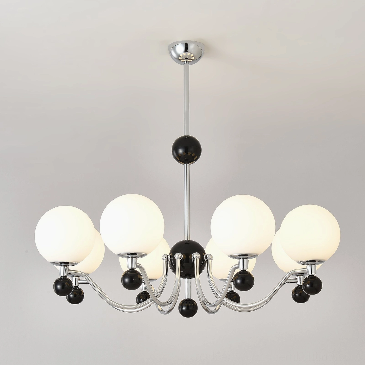 Contemporary spherical chandelier providing layered ambient lighting for modern spaces