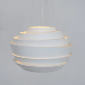 Tiered pendant light overhead perspective warm ambient glow interior lighting design