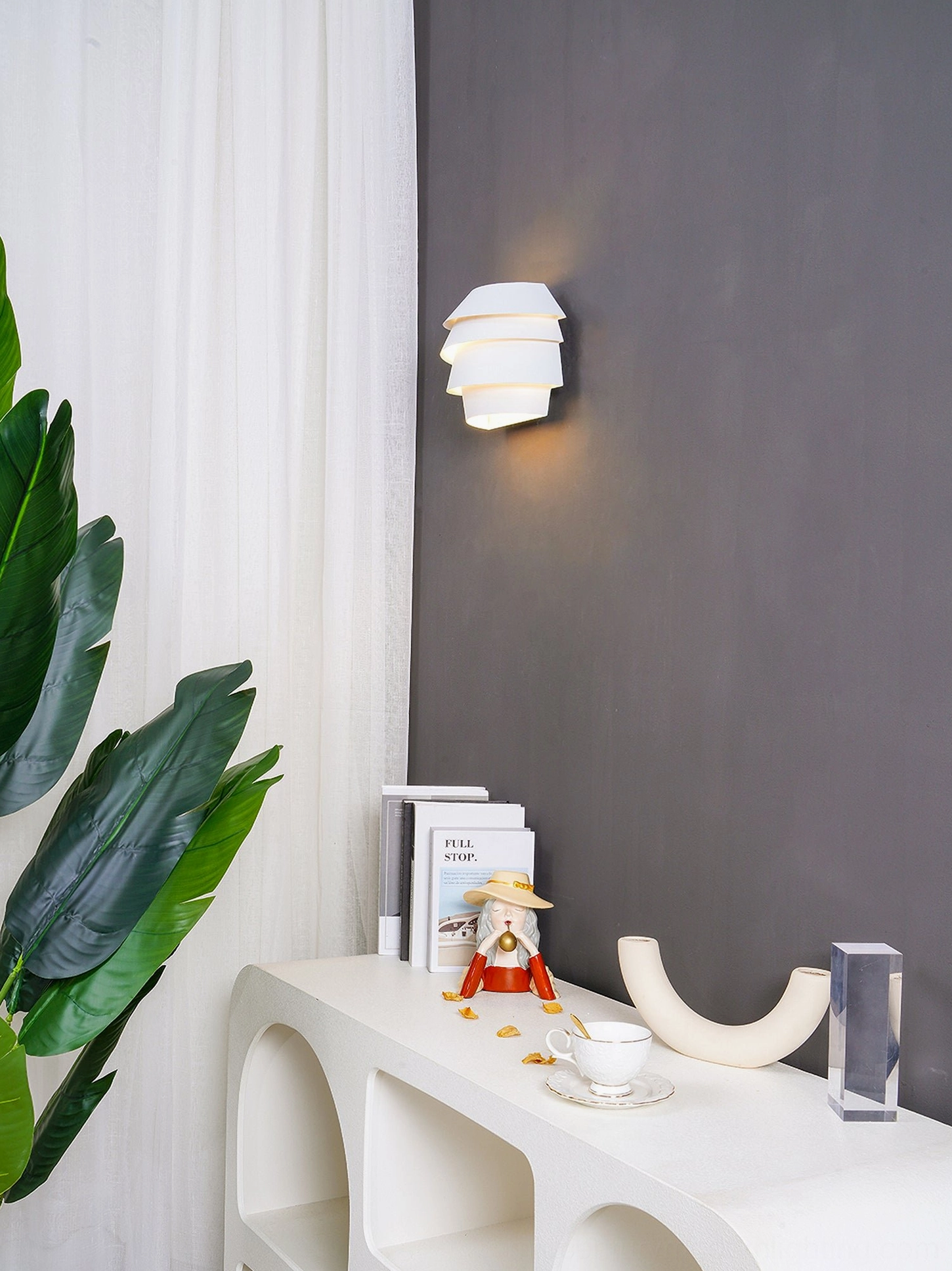 Le Soleil matte white tiered wall sconce front-facing view with rounded form