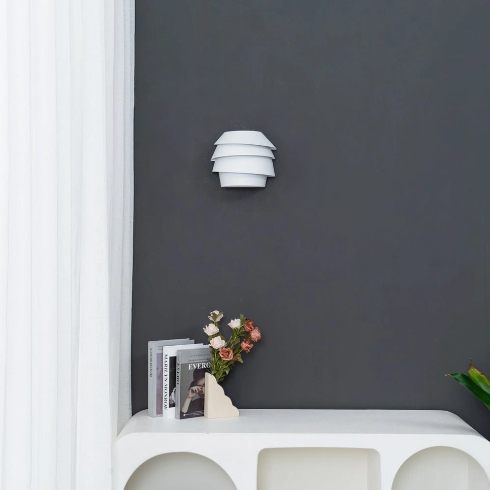 Le Soleil sculptural tiered wall lamp metal construction detail view