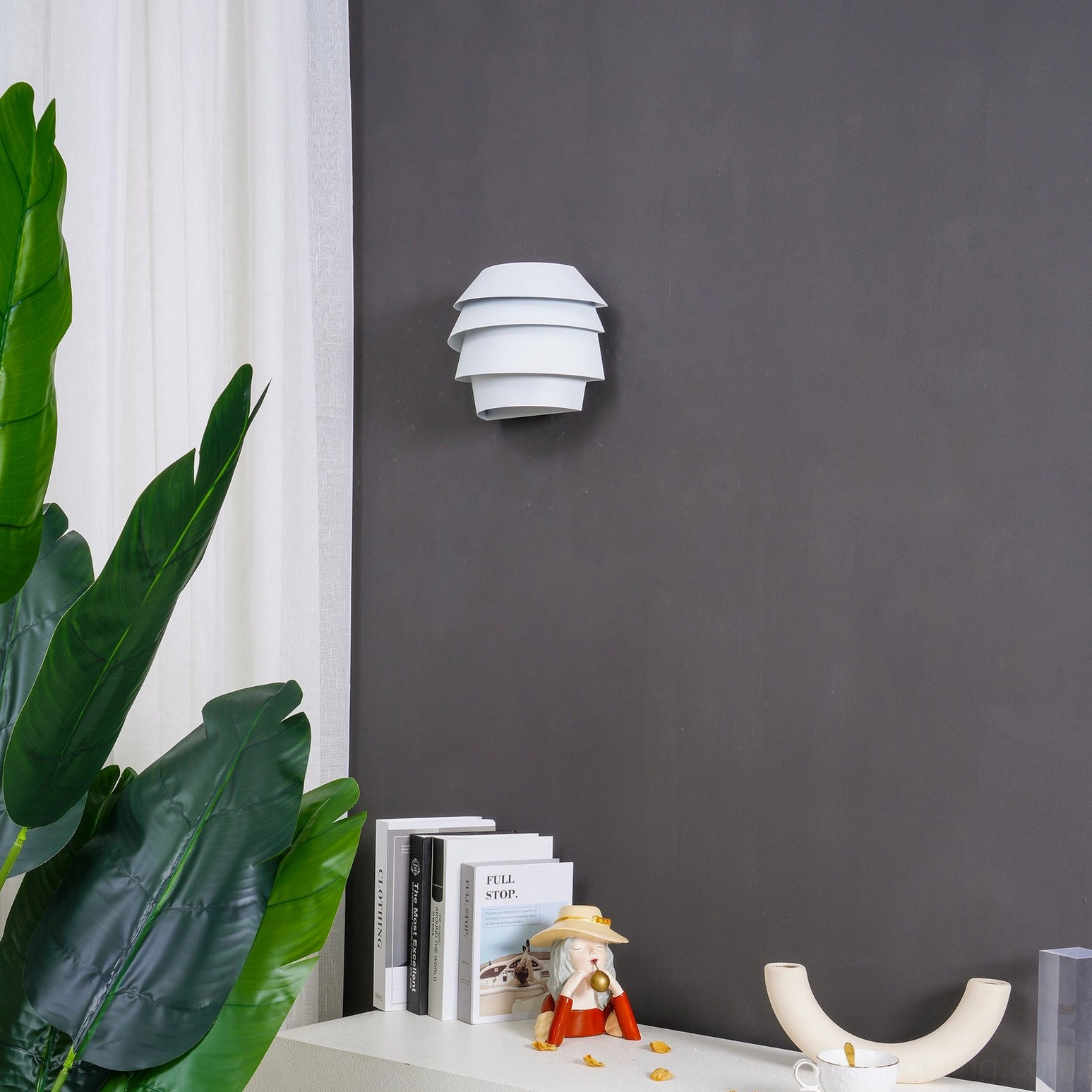 Le Soleil contemporary white wall sconce with sculptural tiered bands design