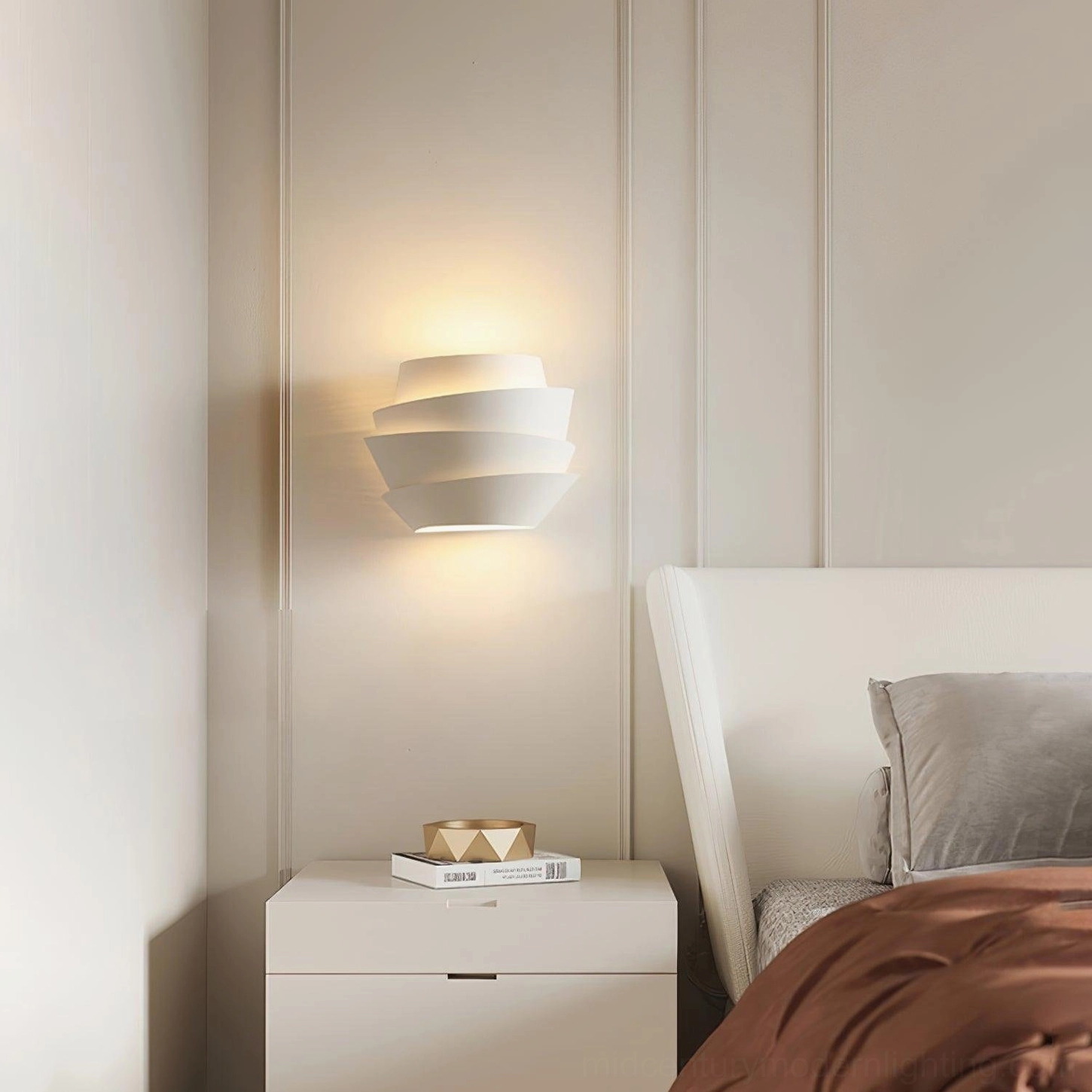 Le Soleil tiered wall lamp showing precision engineering and design craftsmanship