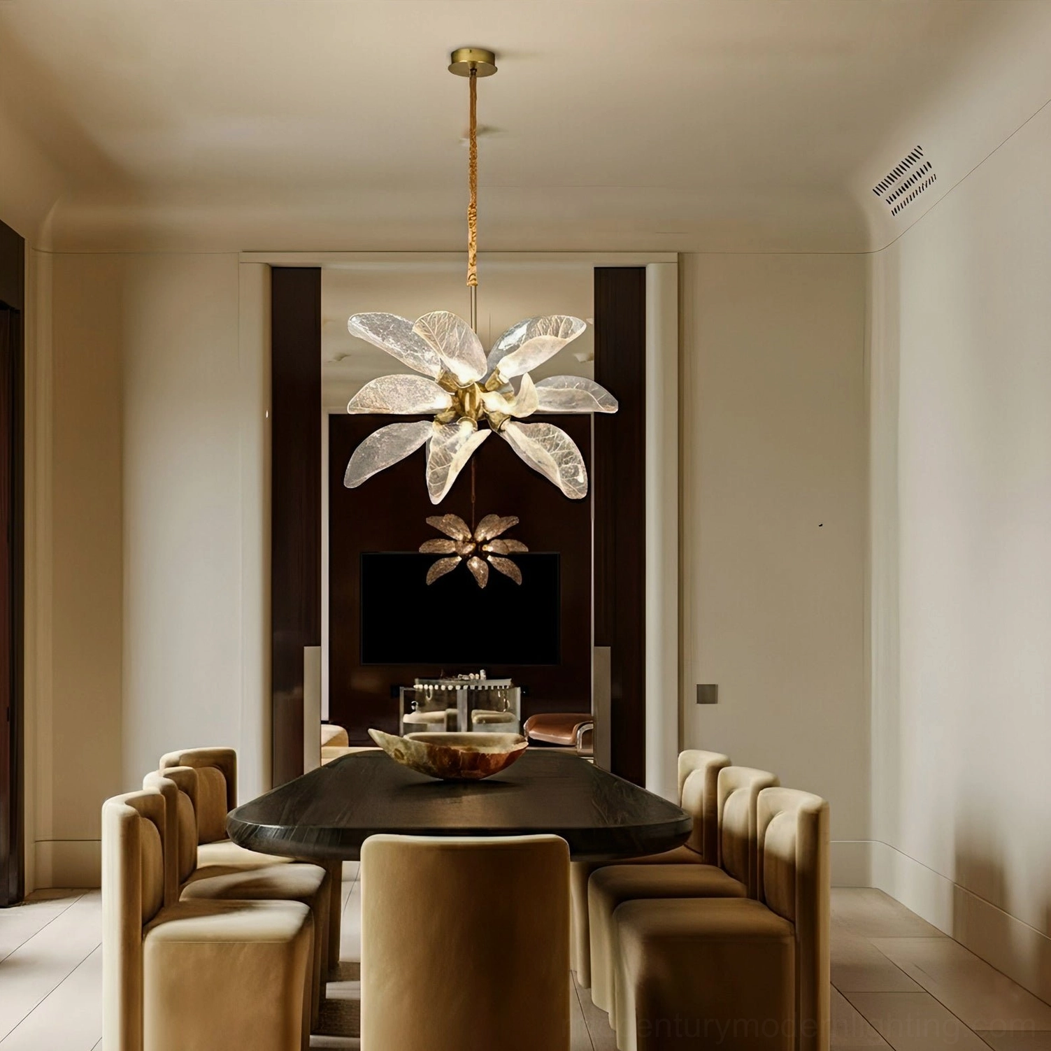 Mid-century modern leaf chandelier in formal dining room with tan upholstered chairs