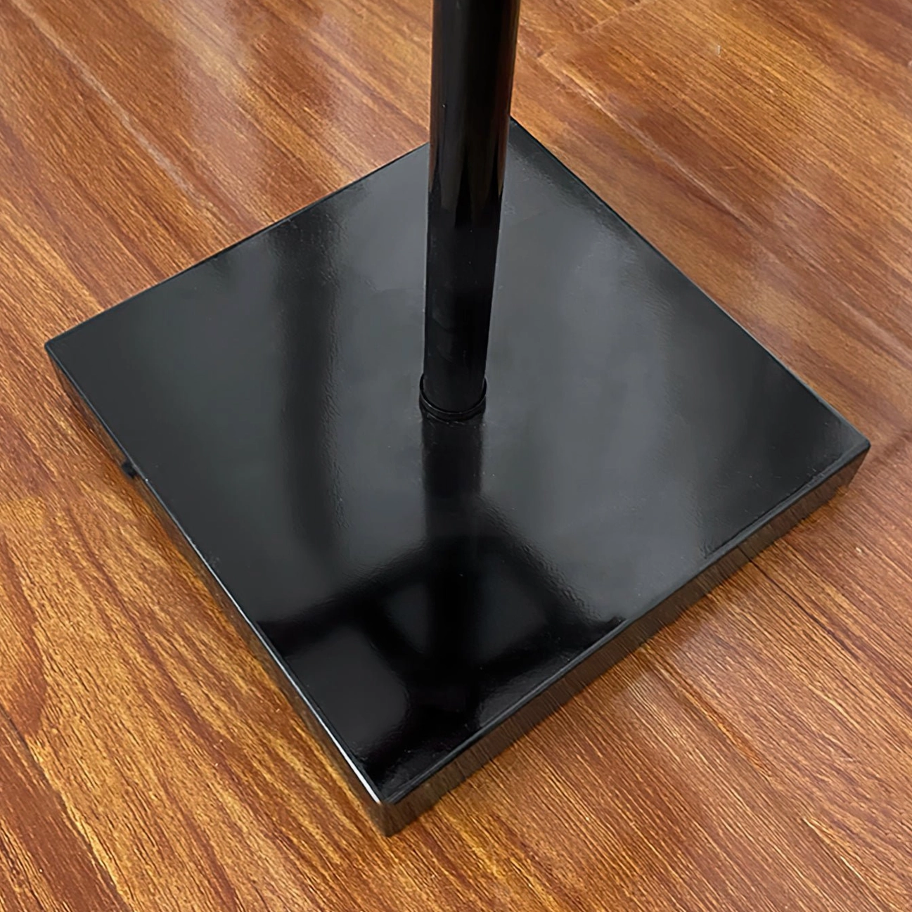 Leaf Floor Lamp base detail showing polished black square metal stand and vertical metal pole