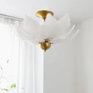 Leaf ceiling light installed in minimalist white bedroom with sheer curtain and green vines botanical styling