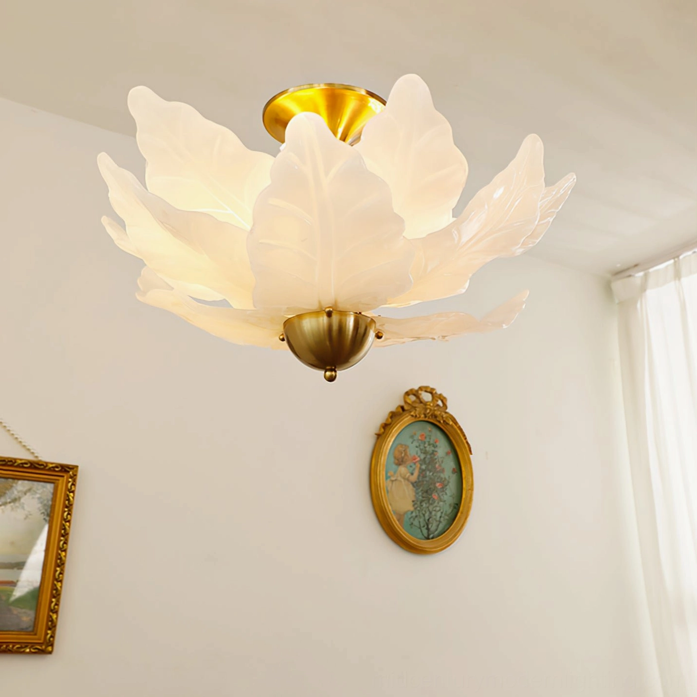 Petal-shaped glass ceiling lamp in French country vintage bedroom with cream-white frosted glass and brass fixture hardware