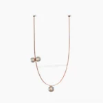 Brown leather strap sculptural ball pendant chandelier with smoked glass spheres and linear LED lights in minimalist modern design