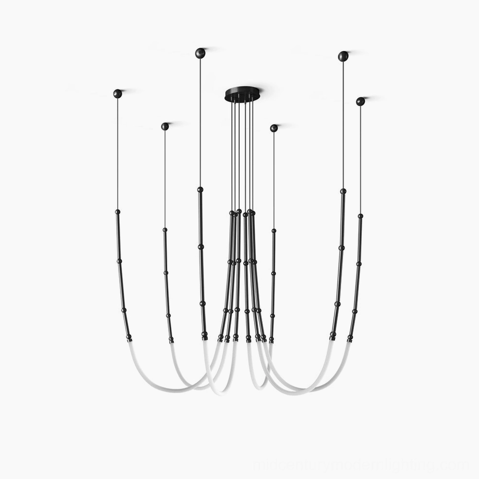 Leda multi-point suspended LED chandelier with curved silicone elements in black minimalist finish, studio product display view