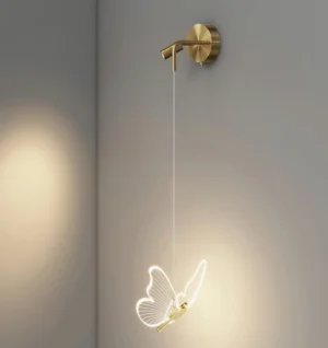 Left butterfly wall sconce side profile showing minimalist brass mounting and glowing acrylic butterfly design