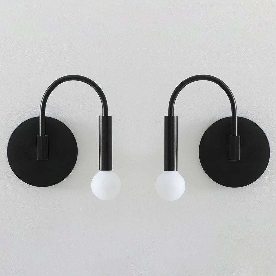 Left and right arch wall sconces in matte black finish, pair configuration