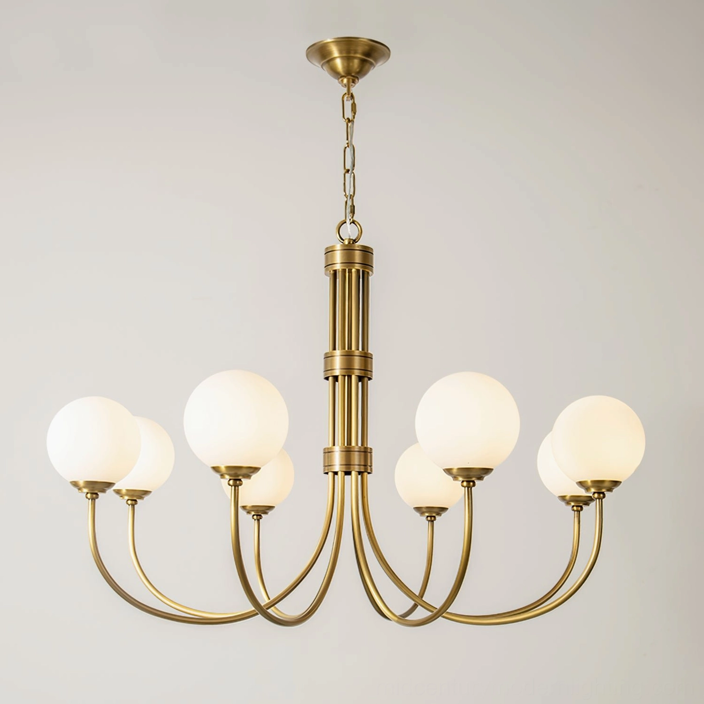 Eight-light brass chandelier with polished brass frame and opal glass shades, close-up front view, vintage mid-century fixture