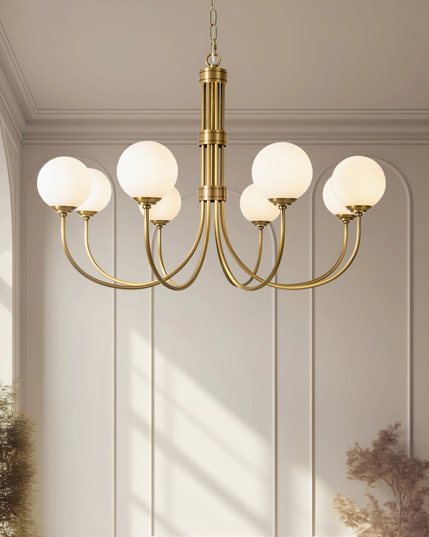 Brass globe chandelier in minimalist room with crown molding and elegant geometric architecture, clean retro lighting fixture