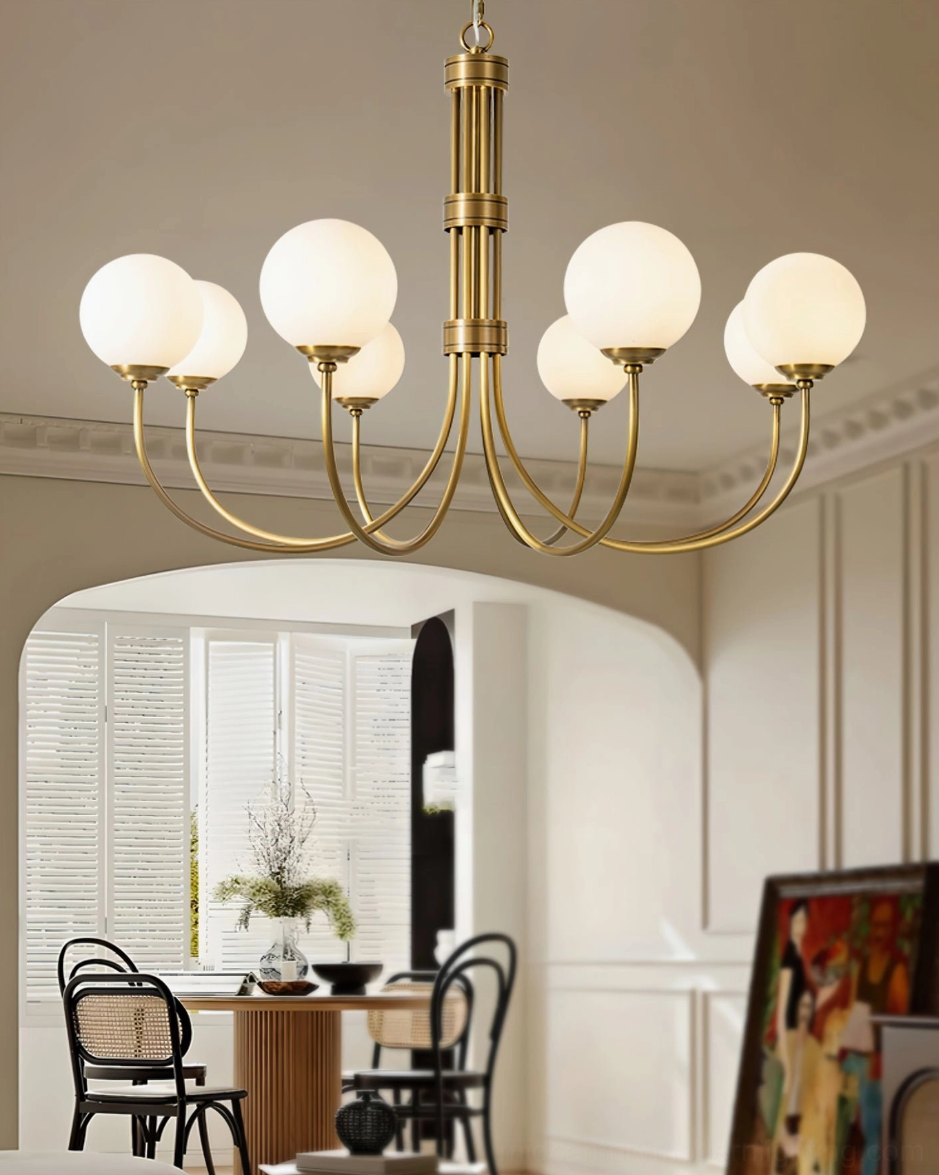 Eight-light brass chandelier in warm-toned retro dining room with traditional home furnishings, cozy ambient lighting scene