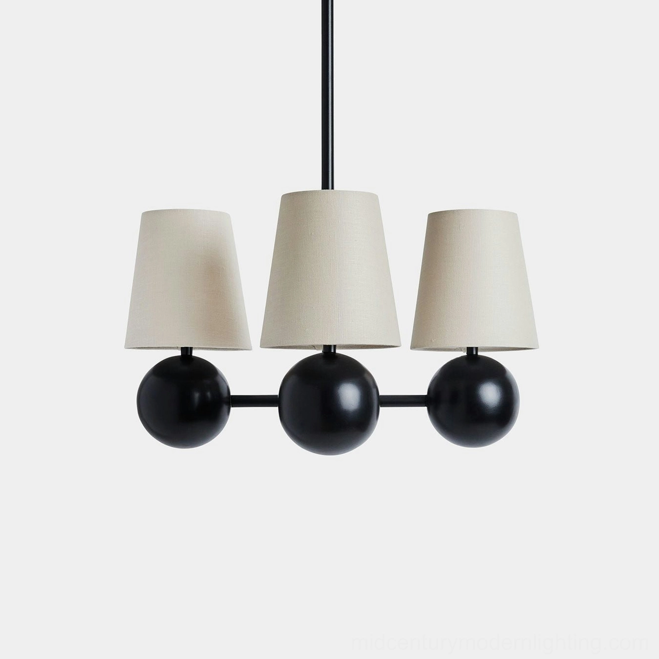 Leoda 3-light chandelier with horizontal bar design, matte black frame, and off-white fabric shades