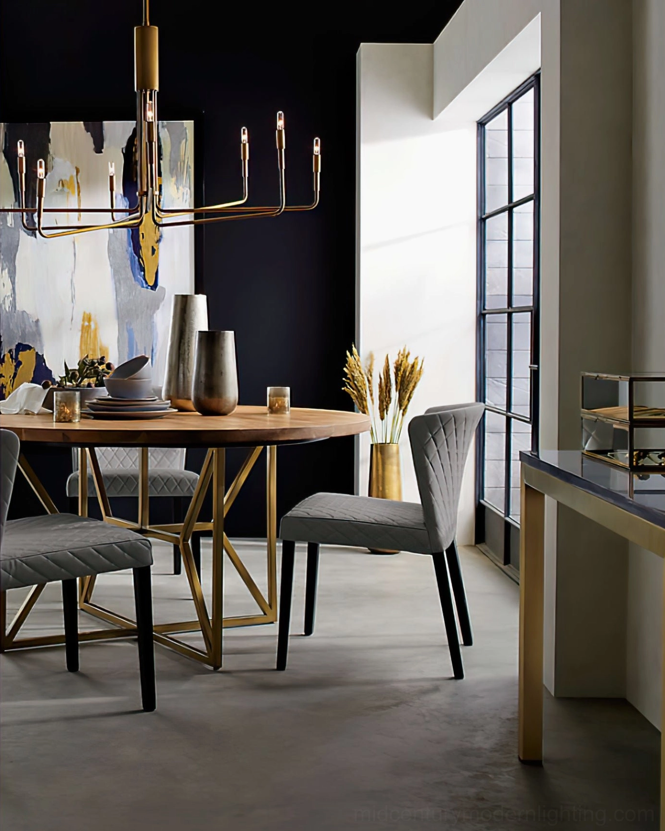 Lepanto brass chandelier eye-level indoor view in casual modern dining space demonstrating warm brass tone integration with contemporary interior design and natural light