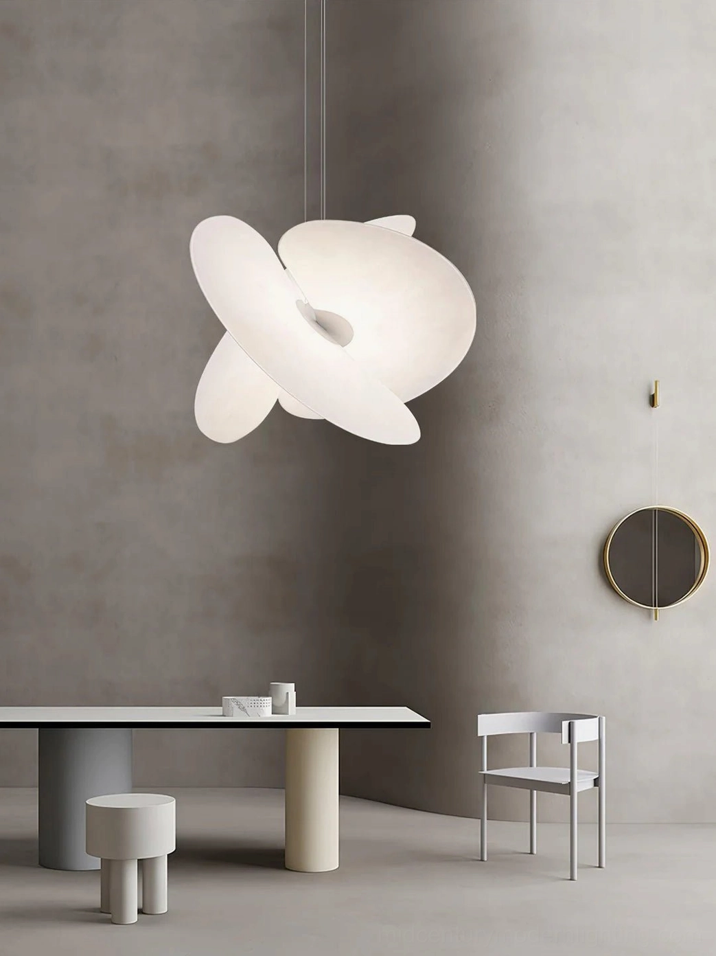 Single flower-shaped Levante pendant light in minimalist dining working area, wabi-sabi matte white organic curved form