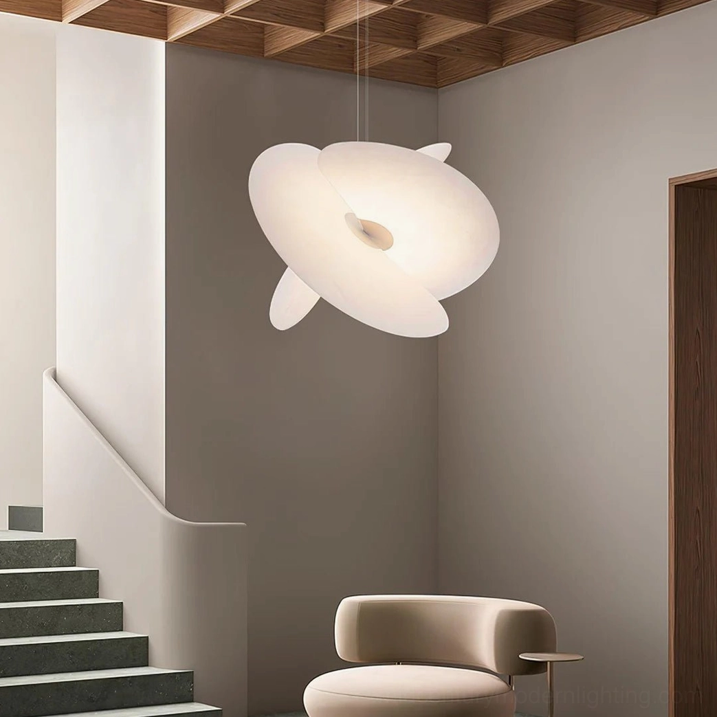 Levante organic pendant lamp side profile, matte white twisted silk disc showing dimensional form and craftsmanship