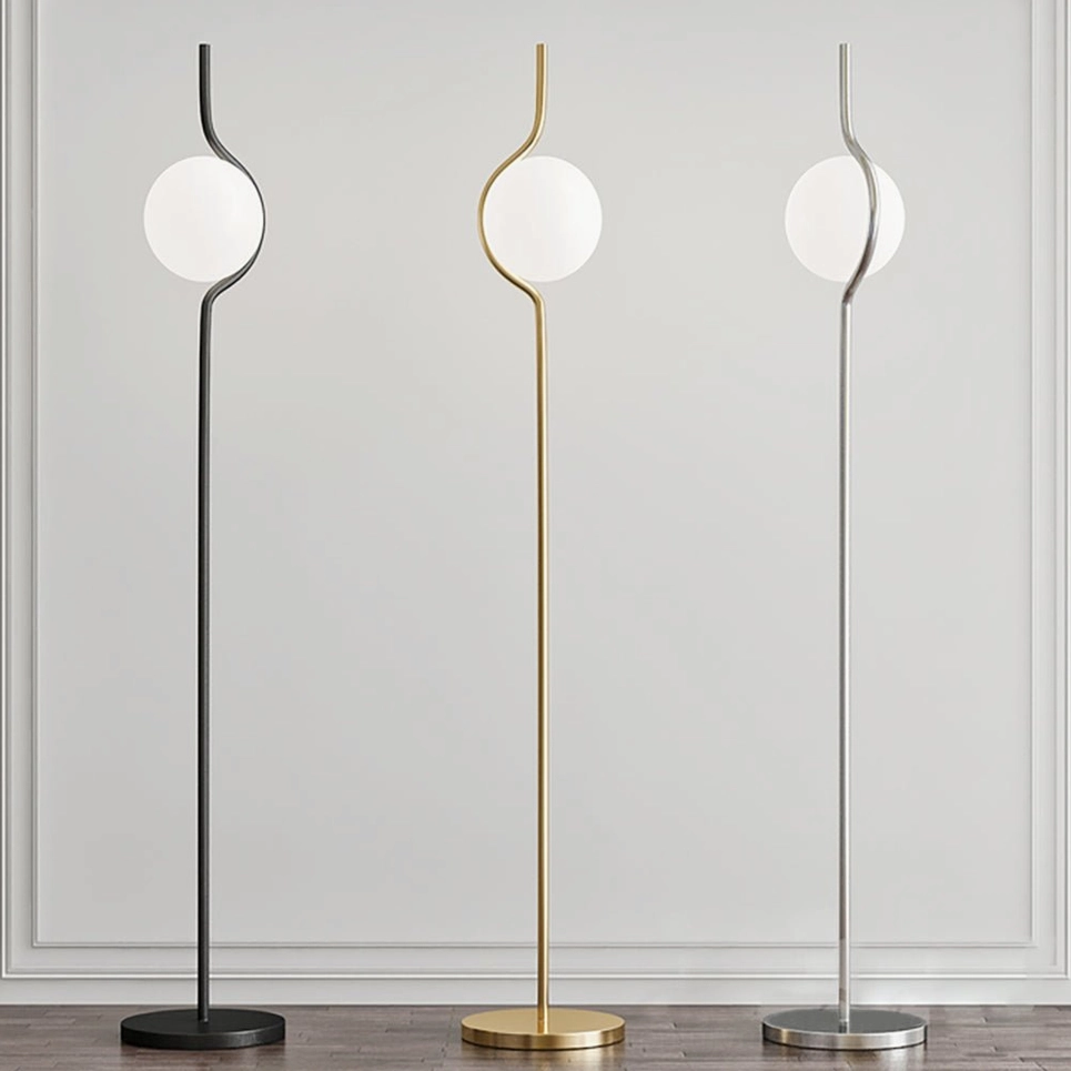 Three color variants of Levita mid-century floor lamps - black, gold brass, and silver finishes side by side comparison