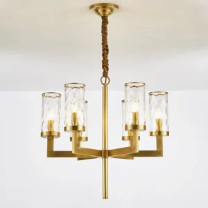 Close-up detail of Liaison chandelier with warm Edison bulbs and twisted brass suspension rod