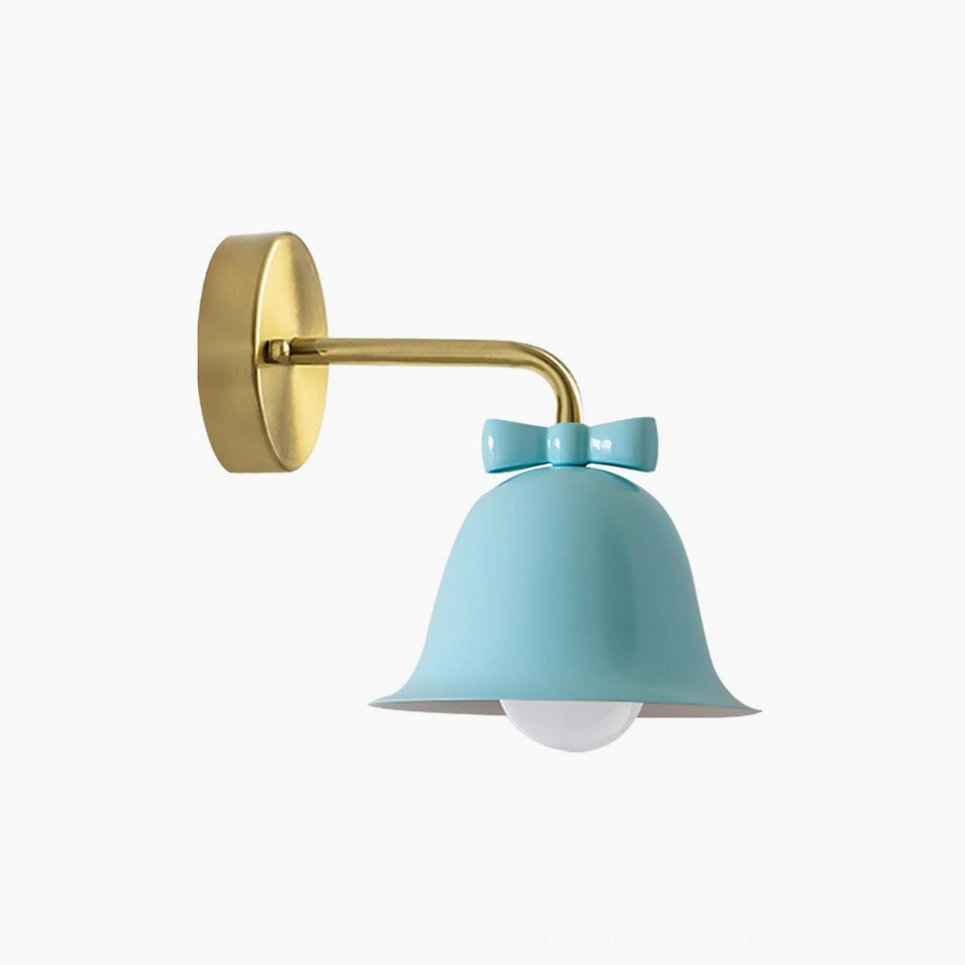 Light blue Bow Bell Wall Lamp positioned above wooden desk in retro home workspace