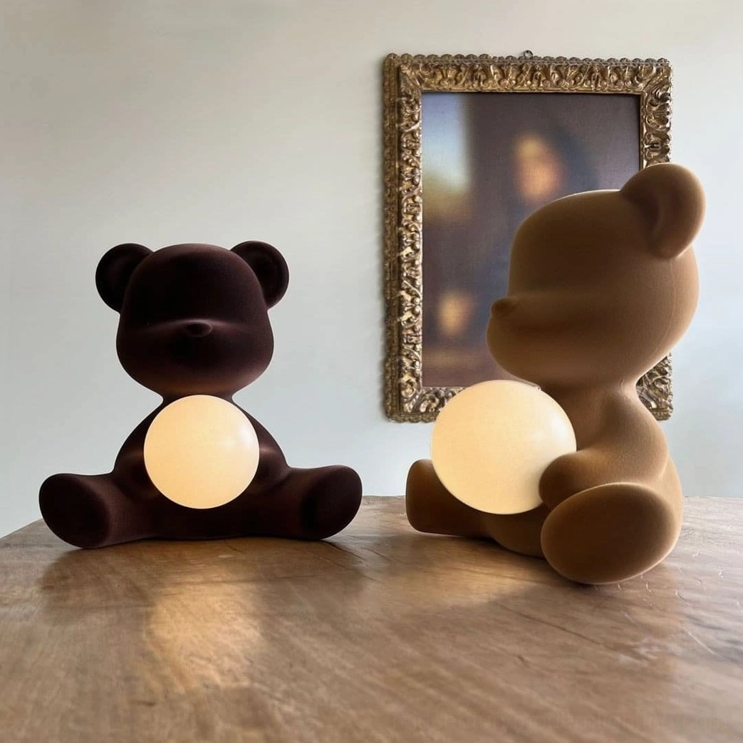 Light brown teddy bear table lamp surface close-up texture photography