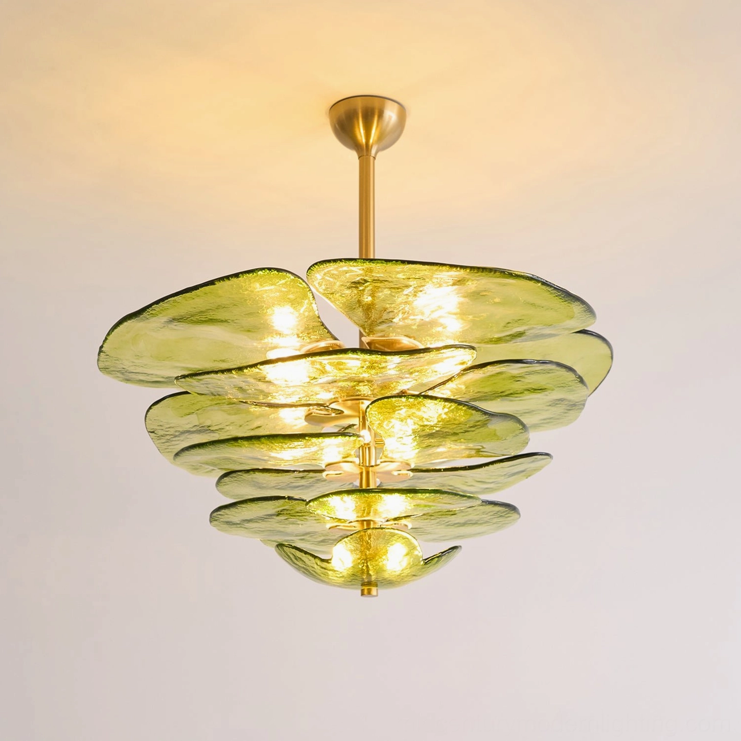 Light green translucent lotus petal chandelier with layered glass structure and brass mounting