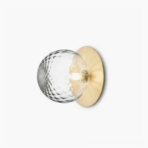 Lila mid-century modern wall sconce with mouth-blown ribbed glass sphere and warm brass backplate, studio front view
