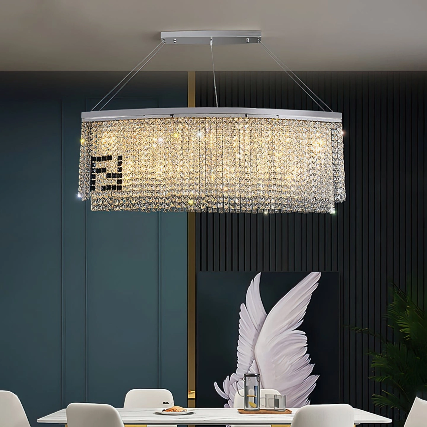 Liliana luxury crystal chandelier in modern dining space with dark accent wall detail