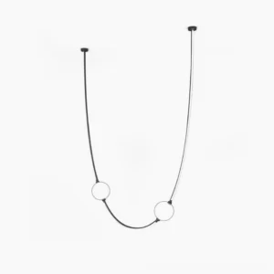 Linea Curva minimalist curved pendant chandelier with dual-tone metal rods and frosted glass spheres on white background