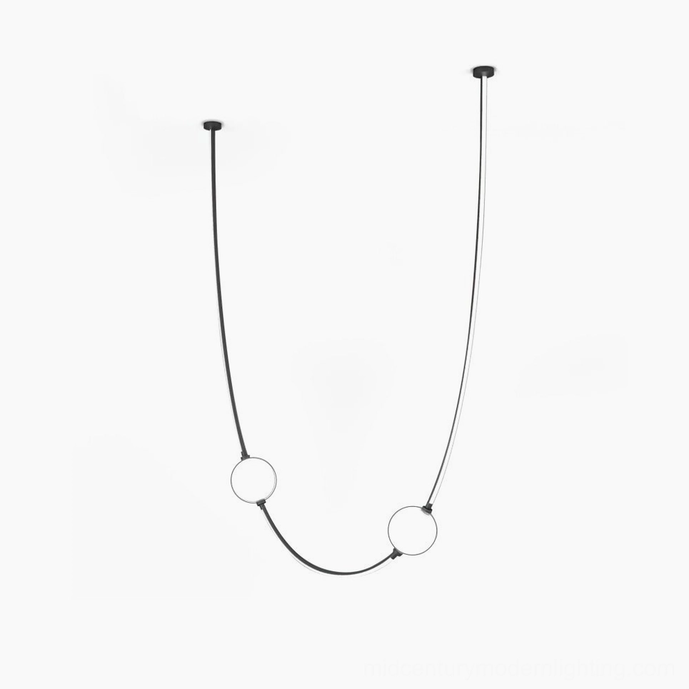 Linea Curva minimalist curved pendant chandelier with dual-tone metal rods and frosted glass spheres on white background