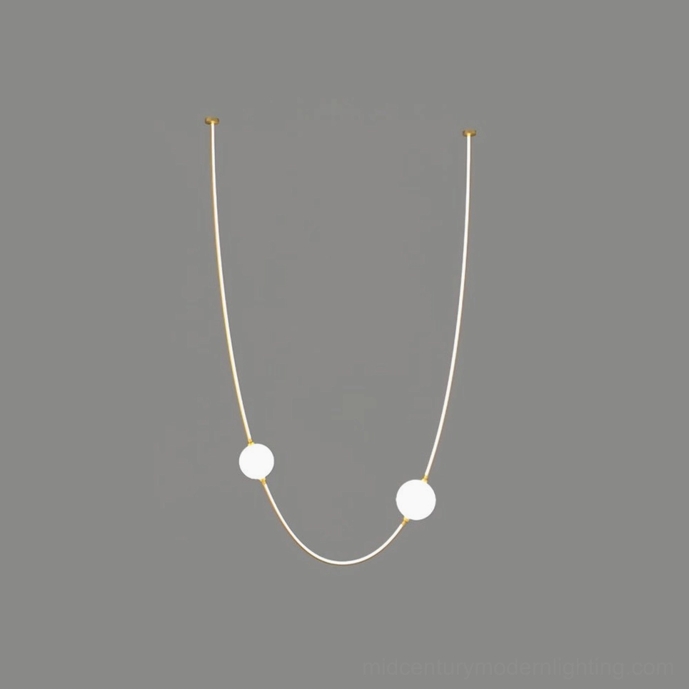 Linea Curva gold finish curved linear pendant light mid-century modern design frosted globes