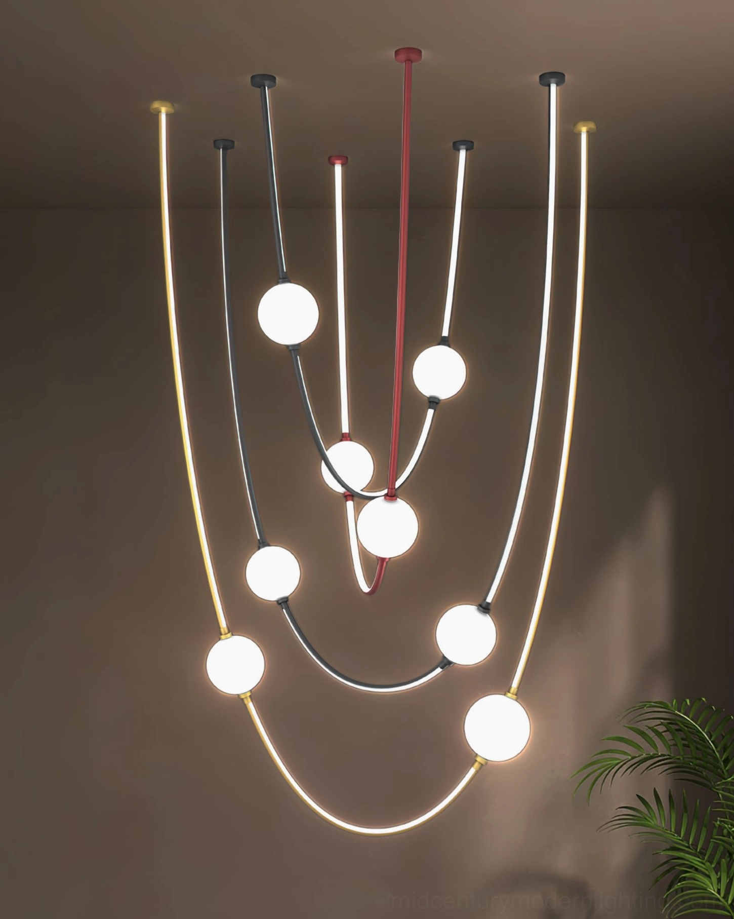 Illuminated Linea Curva multi-strand curved pendant with glowing frosted glass fixtures in contemporary interior