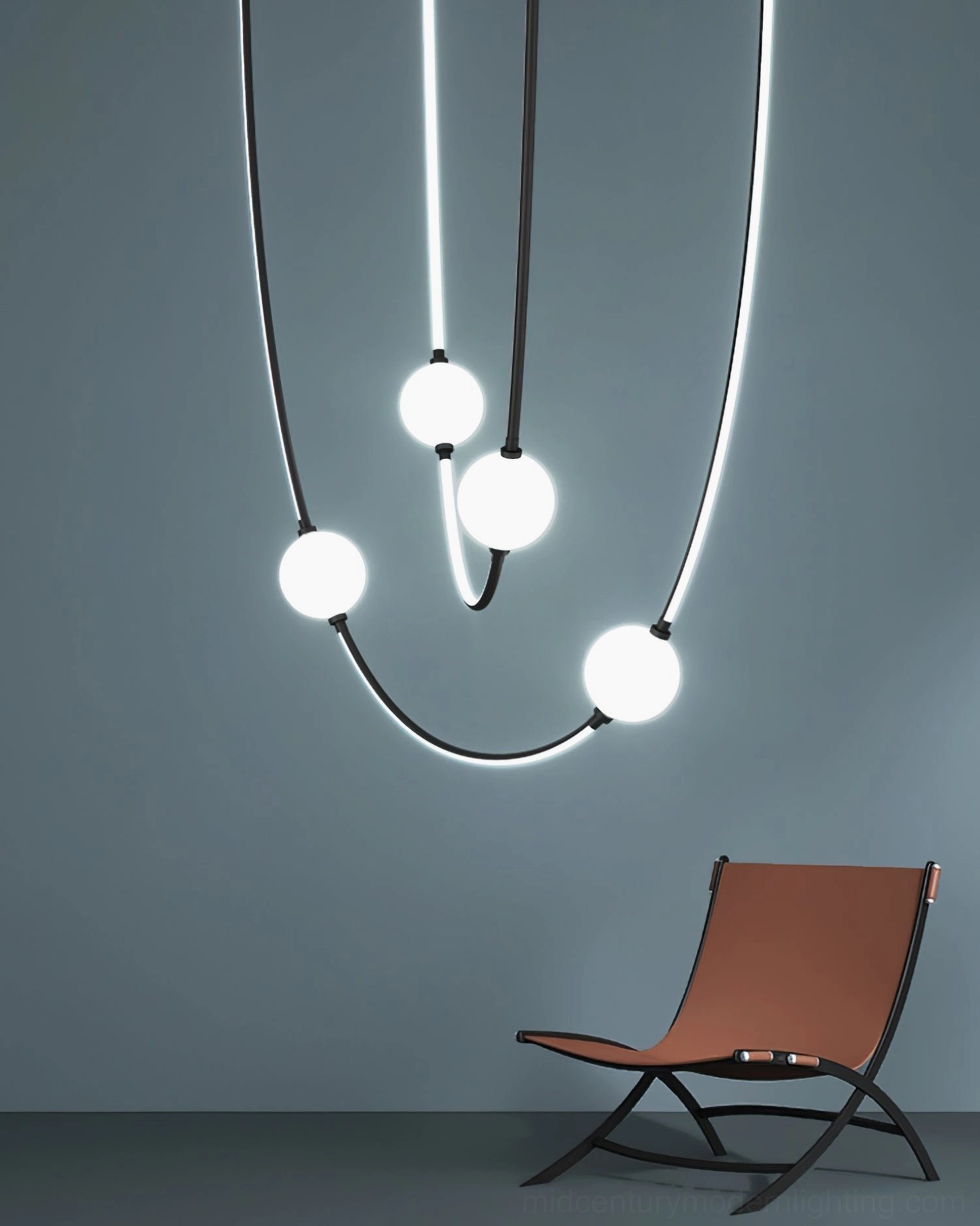 Modern curved linear pendant with mixed black white metal rods and illuminated spherical light fixtures