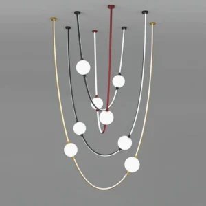 Modern curved linear chandelier with multiple frosted glass ball fixtures and mixed color metal framework in studio setting