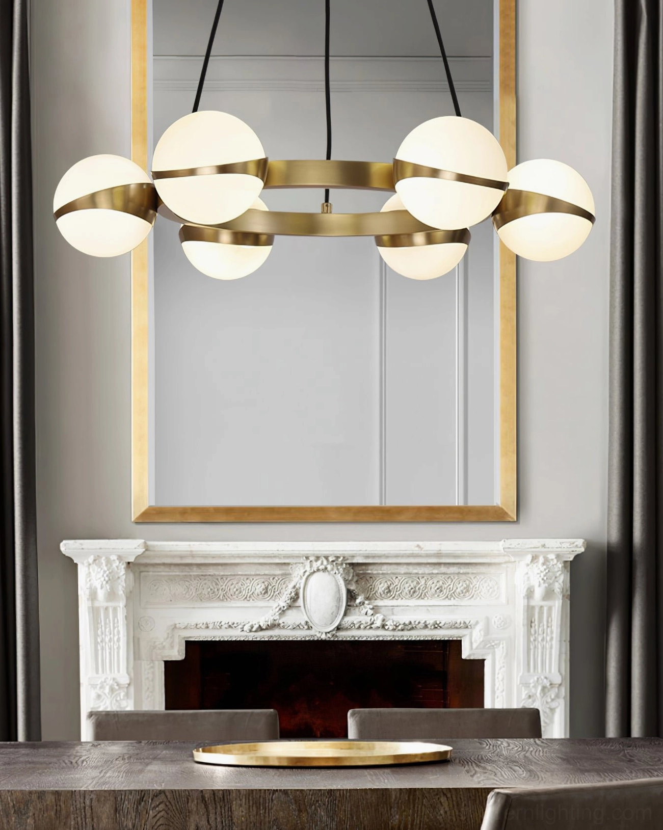 Linear brass chandelier with 4 sets of warm-glowing glass shades in contemporary dining room, mid-century modern style