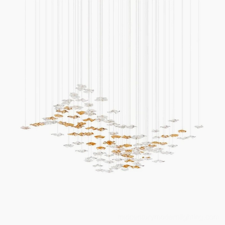 Linear fluid glass chandelier mid-length canopy warm golden finish modern staircase lighting