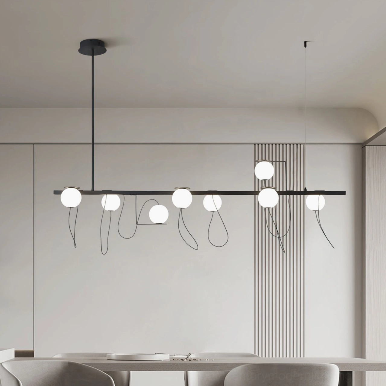 Minimalist linear pendant chandelier with multiple frosted glass bubbles over dining area