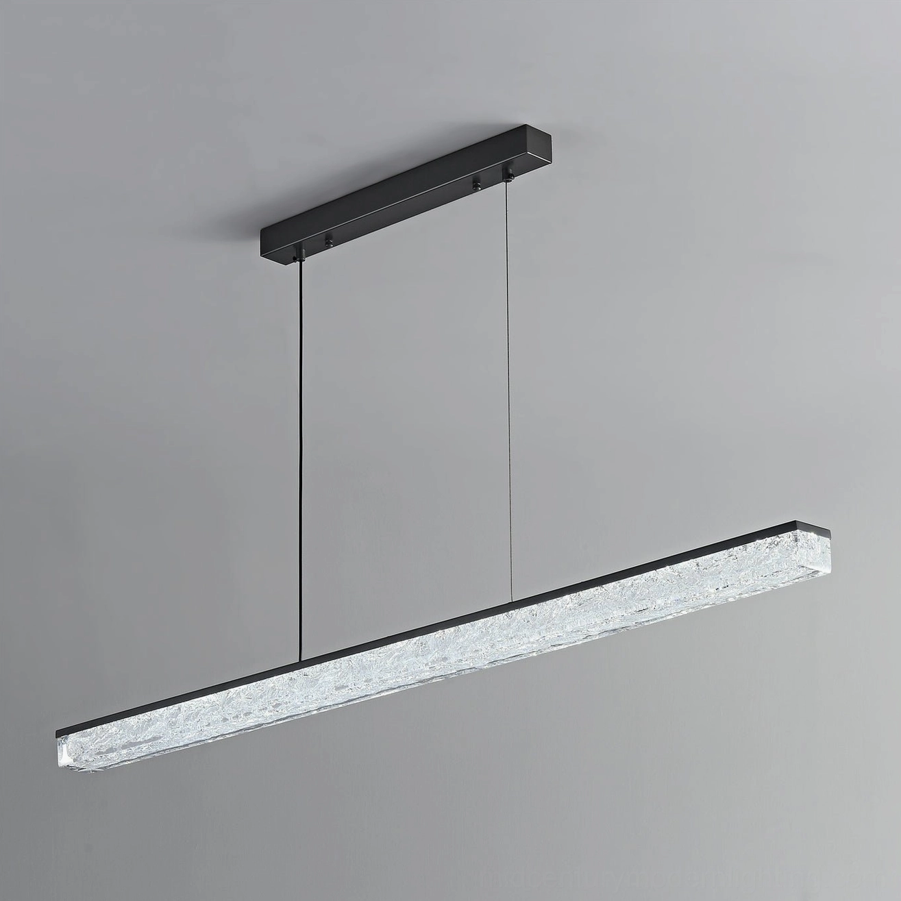 Modern black linear LED pendant chandelier installation detail showing ceiling mounting hardware
