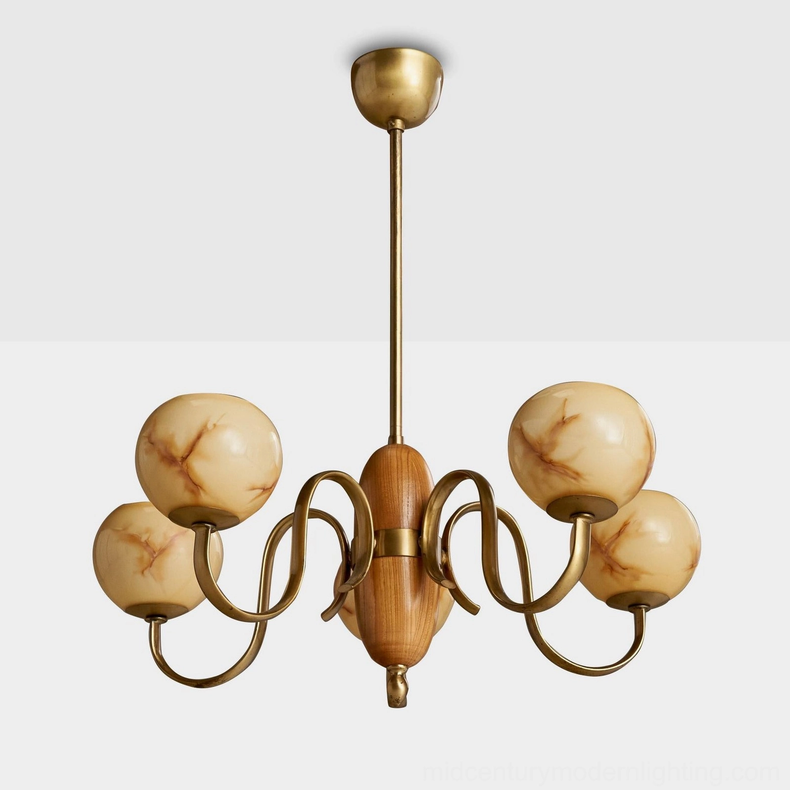 Linnea mid-century chandelier studio view with darker veined cream glass shades and hand-buffed brass curved arms