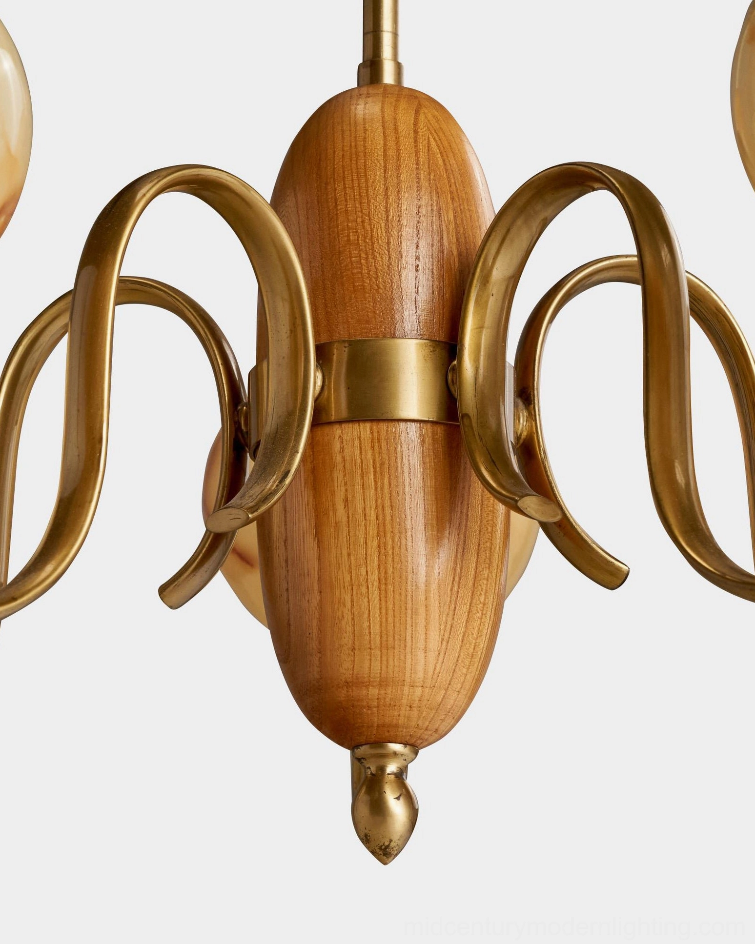 Linnea mid-century modern chandelier close-up of walnut spindle hub and antique brass arm connection