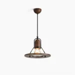 Lioren mid-century industrial pendant lamp with black metal shade and walnut wood accents, overhead studio view showcasing geometric design