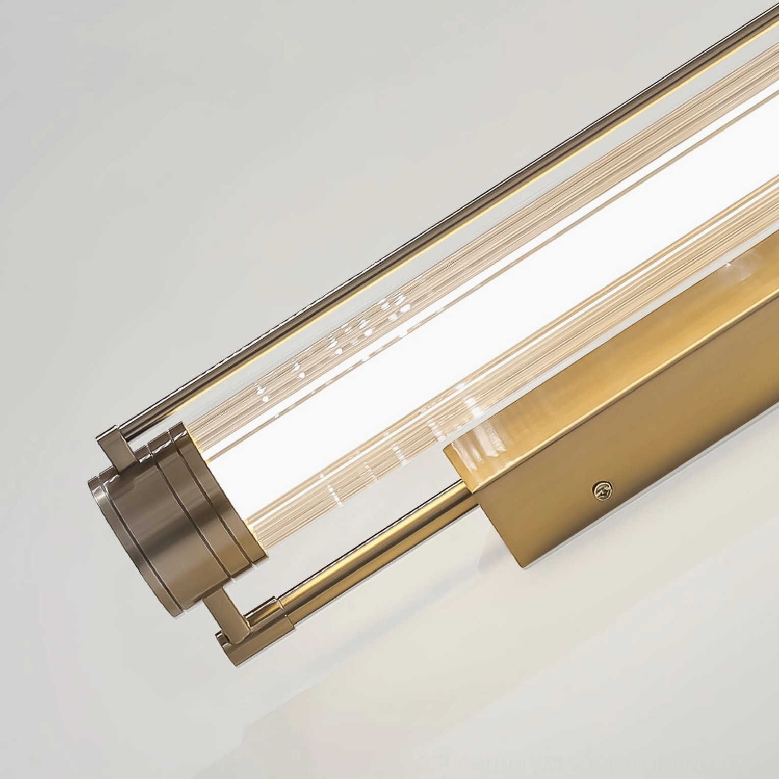 Lirna wall sconce brass detail close-up integrated LED mounting hardware