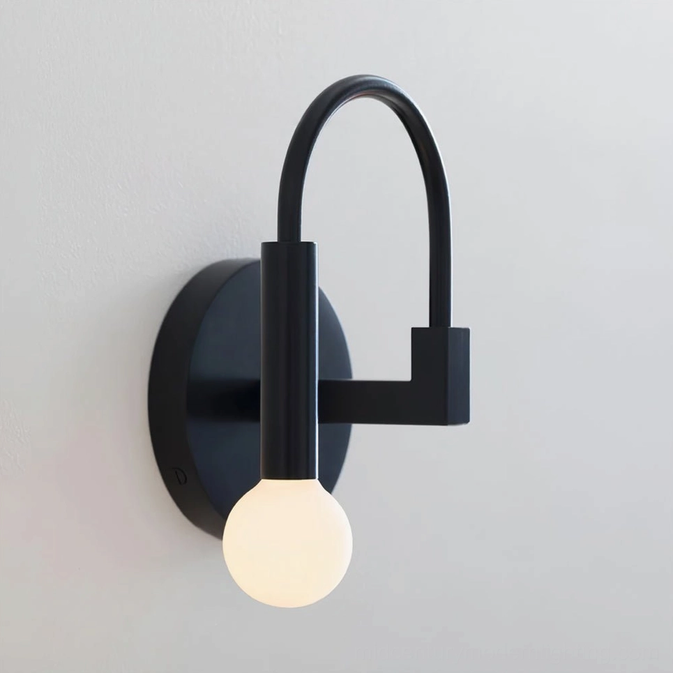 Illuminated arch wall sconce with warm white light glowing through frosted glass, side angle